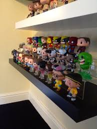 Funko Collection On A Floating Shelf From Ikea I Got The Plastic Risers Off Ebay Funko Pop Shelves Funko Pop Display Diy Display