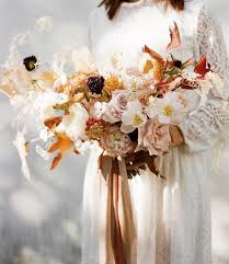 From golden ranunculus to burnished foliage, our favorite floral designers inspire us with these standout small candle lit wedding in the champagne cellar of biltmore estate. Beautiful Airy Bouquet Bridal Bouquet Fall Fall Wedding Flowers Wedding Bouquets