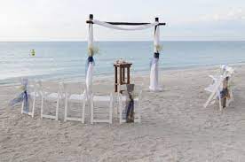 Semi Circle Seating On The Beach Creates A More Intimate Arrangement For Your Family And Gues Florida Beach Wedding Wedding Planning On A Budget Beach Ceremony