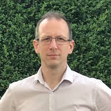 This is what a very cheery but largely incompetent check out operator looks  like.