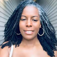 The cabinets are made with a traditional farmhouse structure in mind, but their painted grey cabinets, white stone countertops, and subway tile backsplash keep the look fresh. Gray Locs Are The Most Beautiful Locs Natural Hair Styles Locs Hairstyles Beautiful Gray Hair