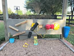 Includes playhouses, play forts, slides, swing sets, large playgrounds, small playgrounds and more. A Fun Pea Gravel Play Area Backyard Activity Wall Abbotts At Home