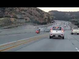 Motorcyclist Kicks Car Causes Chain Reaction Crash On La Freeway Youtube