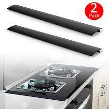 Oven fillers our oven fillers are used to fill a gap below a wall oven when the existing opening height is taller than the height of the new replacement wall oven. Tsv 2 Pack Silicone Kitchen Gap Cover Black Silicone Gap Fillers 21 Premium Silicon Kitchen Space Fillers T Shaped Counter Stove Gap Covers Walmart Com Walmart Com