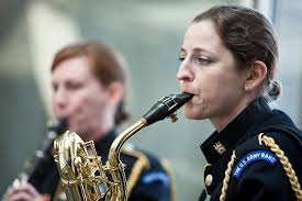 Staff Sgt. Michelle Action, saxophone, performs with