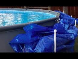 Run garden hoses from nearby water spigots to begin. Diy Pvc Solar Pool Cover Holder Youtube Solar Pool Cover Pool Cover Roller Solar Pool