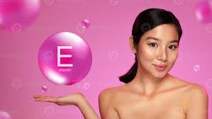 Model showcasing Vitamin E benefits against a vibrant pink background  during a beauty campaign in a studio setting 66558973 Stock Photo at  Vecteezy