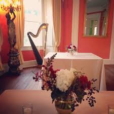 Romantic Centerpiece Of Plum And White In A Romantic Setting At The William Aiken House Charleston Sc Romantic Centerpieces Reception Flowers Centerpieces