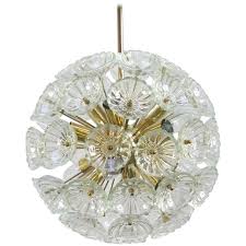 Way too rich for me, but creative and lovely! 1960s German Sputnik Dandelion Twelve Light Chandelier Vinterior