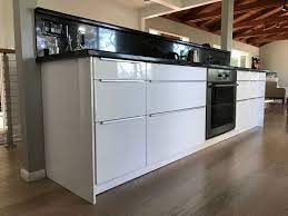 The new shining star of kitchen is high gloss cabinetry. Finished And Completed Ikea Kitchen Sektion Cabinets Ringhult White High Gloss Fronts With Blank White Ikea Kitchen Kitchen Builder Contemporary White Kitchen