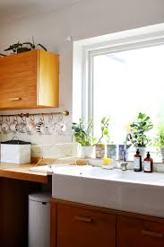 If you have an old filing cabinet lying around, you can easily repurpose it as a unique rolling island perfect for any small apartment kitchen. How To Refresh An Ugly Kitchen For Under 100 With My 10 Tips Swoon Worthy