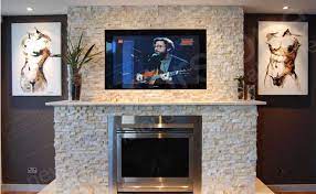 For more information about stone veneer fireplaces Natural Stacked Stone Veneer Fireplace Stone Fireplace Ideas