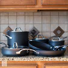 Calphalon's product line contains ptfe in its surfaces, as does teflon. Calphalon Signature Nonstick Cookware Review Truly Nonstick