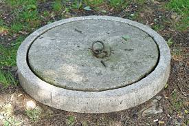 Barkman concrete began producing septic tanks in 1952, and over the years, we have continued to serve our customers' needs with reliable precast concrete tanks made through the raw sewage must be hauled elsewhere for disposal. Concrete Lid At Septic Tank Reservoir Stock Photo Picture And Royalty Free Image Image 75317855