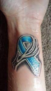The cancer ribbon tattoo is used with various colors to identify victims and survivors of cancer. Prostate Cancer Tattoos For Guys Top 70 Most Thoughtful Cancer Ribbon Tattoos 2020 15 Off With Code Zspecialnews