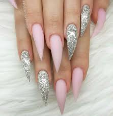 Stiletto Nails Pink Stiletto Nails Pink Nails Glitter Nails Silver Glitter Nails Matte Nails Acrylic Nails Stiletto Pink Stiletto Nails Stiletto Nail Art Stiletto nails with pink and zebra print.