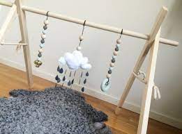 Während der spielbogen aus holz besteht, wurde das spielzeug aus kunststoff gefertigt. Krabbeldecke Spielbogen Perlen Holz Wolke Stoff Gerust Selber Bauen Spielbogen Baby Spielbogen Neugeborenen Zimmer