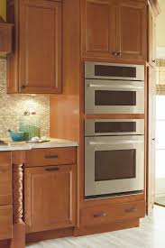 Decide what kind of fitting you prefer in your tall kitchen unit, like adjustable shelves, drawers or other smart storage solutions. Double Oven Cabinet Diamond Cabinetry