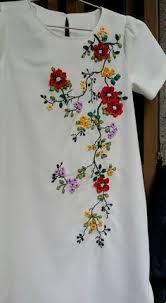 Try embroidering flowers with french knot centers! Image Result For Recycling A Blouse With Embroidery Of Small Flowers Blouse Embroider Embroidery Designs Fashion Kurti Embroidery Design Embroidered Clothes