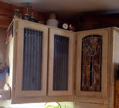 Wire mesh grill inserts offer not only a visually pleasing accent to many furniture & cabinetry designs but they also offer an additional functional purpose by allowing airflow to and from the mesh area where there may be a need for breathability. Old Galvanized Roof Panels For Cabinet Door Inserts Diy Cabinet Doors Diy Door Galvanized Roofing