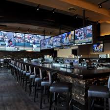 When people think about what it means to be quintessentially boston, it's often not bars, but things like boston cream pie, fenway park, and revolutionary history inevitably top the list. The 8 Best Sports Bars In Boston For March Madness Sports Bar Decor Bar Design Restaurant Sport Bar Design