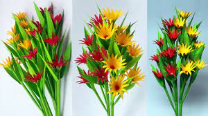 This construction paper craft tutorial is one of our most popular projects on pinterest. Colors Paper Easy Make Paper Flower Stick Paper Stick Flowers Easy Paper Craft Ide