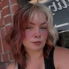 Any hairstylist available today or Thursday for just a woman's cut?