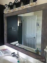 Diy Stick On Mirror Frame Sawdust Sisters In 2020 Bathroom Mirrors Diy Diy Mirror Frame Bathroom Bathroom Mirror Makeover