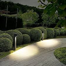 An Unobtrusive Way To Add Gentle Illumination To Your Outdoor Decor The Bega Led Garden An Modern Outdoor Setting Modern Landscaping Landscape Lighting Design