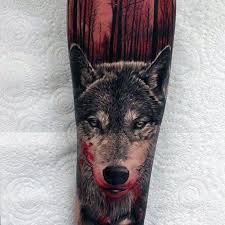 50 Realistic Wolf Tattoo Designs For Men Canine Ink Ideas Wolf Tattoo Design Red Ink Tattoos Tattoo Designs Men