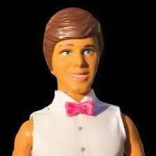 The doll towers over the other Ken dolls to reflect James' real height of  6-feet, 9-inches.