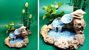 Cara Membuat Air Terjun Mini Hiasan Meja Dari Lem Tembak Dan Kerang Di 2020 Hiasan Meja Air Terjun Hiasan