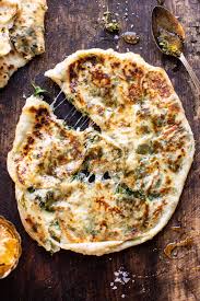 Cheesy Herb Stuffed Naan With No Yeast Option Half Baked Harvest Recipe In 2020 Recipes Food Naan