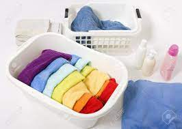 The towel color can also help set the mood in the bathroom. Wash Colored Laundry Detergents And Towels In White Plastic Basket Basket With Colorful Rainbow Laundry To Wash Stock Photo Picture And Royalty Free Image Image 22027598