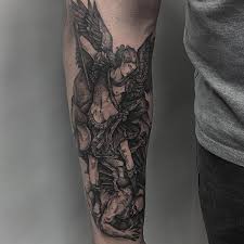 These images often show the saint holding a sword that pierces the satan. Best St Michael Tattoo Design Ideas 2018