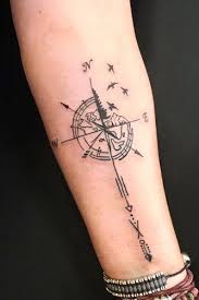 This half sleeve koi fish tattoo design actually looks like a giant whale. A Guide To Compass Tattoo With Cool Design Ideas