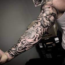 'jesus' tattoo on his right arm. Tattoo Sleeve Shading Designs