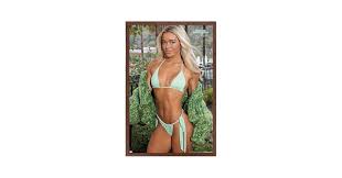 Trends International Sports Illustrated: Swimsuit Edition - Olivia Dunne 24  Wall Poster, 22.4L x 14.7W, Mahogany Framed Version