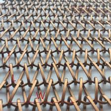 Copper is the color of the metal copper. China New Arrival China Partition Metal Mesh Xy A1215b Paint Copper Color Link Weave Decorative Wire Mesh For Room Divider Shuolong Manufacture And Factory Shuolong