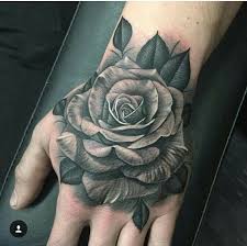 These designs ingeniously fuse eastern origami with western if you know money like the back of your hand, place your piece accordingly with a money rose hand tattoo. Rose Hand Tattoo Hand Tattoos Rose Hand Tattoo Rose Tattoos