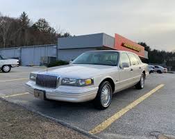 Image result for Electric Current Red 1995 Town Car