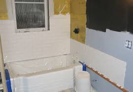 Laying herringbone tile may be slightly more complicated than laying a traditional offset pattern as it involves diagonal cuts around outlets and the edges of your space. Cement Board Up And Adam Ries