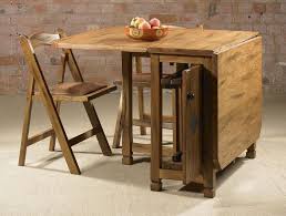 How To Buy A Folding Table And Chairs Set Designalls In 2020 Dining Table Chairs Folding Dining Table Folding Kitchen Table