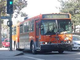 Westbound Sunset Blvd Proceeds And Crosses At Castellammare Drive Intersection Traffic Signal Green Lights And Pedestrian Crosswalk Crossing Don T Walk Orange Bus Terminal Bus Bus Stop