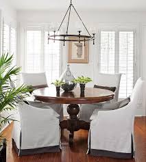 16 Cozy Winter Decorating Ideas You Can Keep Up All Season Long Slipcovers For Chairs Parsons Dining Chairs Neutral Dining Room