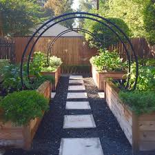 Talk About The Perfect Backyard Escape Rootedgarden Says This Spot Was Just Plain Old G In 2020 Small Backyard Landscaping Backyard Landscaping Garden Arch Trellis
