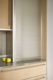 Homestyles range of kitchen cupboard door designs is the largest in the uk. Retractable Cabinet Door Photos Modern Kitchen Interiors Modern Kitchen Photos Kitchen Room Design