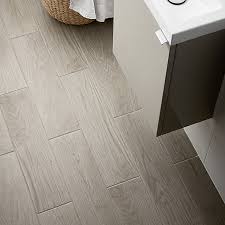 Tile floors are a natural choice for kitchens. Arrezo Grey Matt Wood Effect Porcelain Wall Floor Tile Pack Of 14 L 600mm W 150mm Diy At B Q