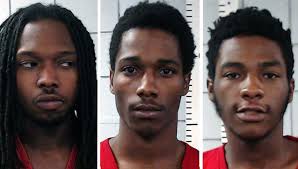 3 people charged in killing that was fueled by the theft of a bottle of  Hennessy, police say