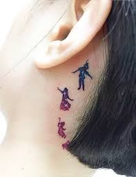 Small Watercolor Peter Pan Behind The Ear Tattoo Tattoos For Women Peter Pan Tattoo Neck Tattoo